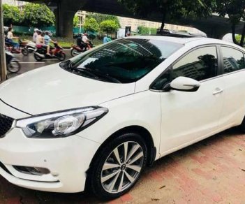 Kia K3   1.6 MT  2015 - Gia đình bán Kia K3 1.6 MT đời 2015, màu trắng 