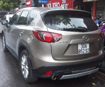 Mazda CX 5 2.0 AT 2015 - Bán ô tô Mazda CX 5 2.0 AT năm 2015, màu vàng cát, số tự động