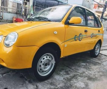 Toyota Yaris 2005 - Bán Toyota Yaris 2005, màu vàng, nhập khẩu