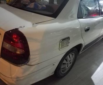 Daewoo Nubira 2002 - Cần bán xe Daewoo Nubira năm sản xuất 2002, màu trắng