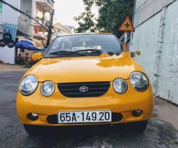 Toyota Yaris 2005 - Bán Toyota Yaris 2005, màu vàng, nhập khẩu