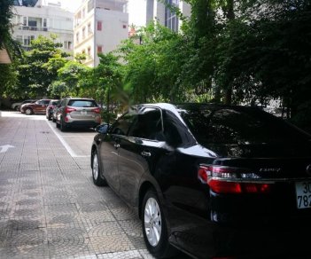 Toyota Camry 2.0 D4S 2015 - Cần bán xe Toyota Camry 2.0 D4S đời 2015, màu đen chính chủ, giá chỉ 880 triệu