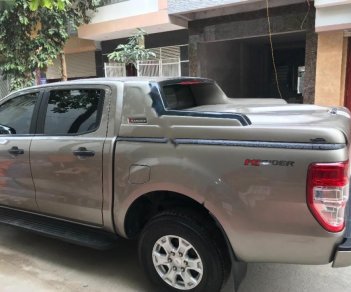 Ford Ranger XLS 2.2L 4x2 AT 2015 - Bán Ford Ranger XLS 2.2L 4x2 AT sản xuất năm 2015, màu vàng cát, nhập khẩu 