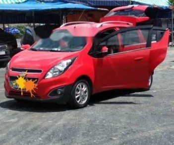 Chevrolet Spark 2014 - Bán Chevrolet Spark sản xuất 2014, màu đỏ xe gia đình