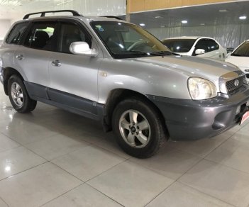 Hyundai Santa Fe 2.0AT 2004 - Cần bán xe Hyundai Santa Fe 2.0AT 2004, màu bạc, nhập khẩu nguyên chiếc giá cạnh tranh