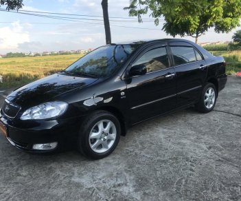 Toyota Corolla altis 1.8G MT 2006 - Bán Toyota Corolla altis 1.8G MT sản xuất năm 2006, màu đen