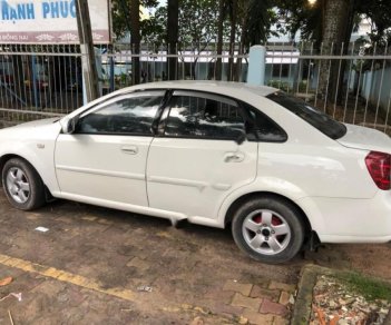 Daewoo Lacetti EX 1.6 MT 2004 - Cần bán lại xe Daewoo Lacetti EX 1.6 MT đời 2004, màu trắng