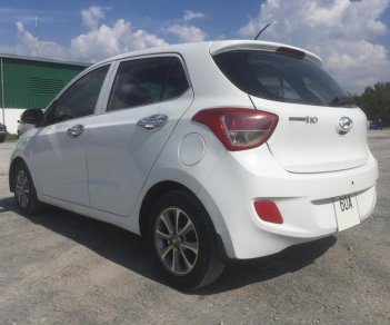 Hyundai Grand i10 1.0MT 2014 - Bán ô tô Hyundai Grand i10 1.0MT năm sản xuất 2014, màu trắng, xe nhập