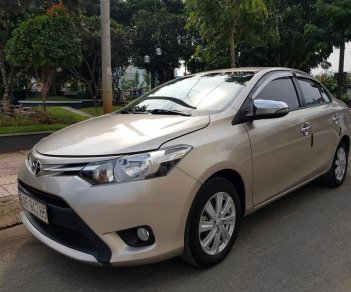 Toyota Vios E 2016 - Cần bán xe Toyota Vios (1.5 E) CVT, sản xuất 2016, màu ghi-vàng, gia đình sử dụng mới 98%