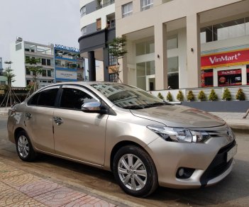 Toyota Vios E 2016 - Cần bán xe Toyota Vios (1.5 E) CVT, sản xuất 2016, màu ghi-vàng, gia đình sử dụng mới 98%