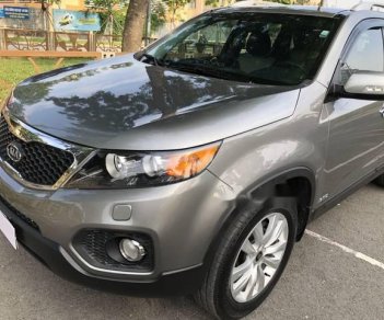 Kia Sorento  2.4AT 2012 - Cần bán lại xe Kia Sorento 2.4AT sản xuất năm 2012, màu xám, 555tr