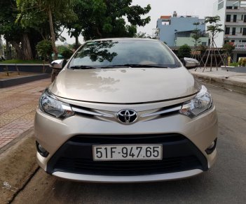 Toyota Vios E 2016 - Cần bán xe Toyota Vios (1.5 E) CVT, sản xuất 2016, màu ghi-vàng, gia đình sử dụng mới 98%