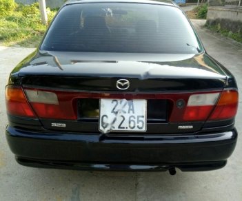 Mazda 323 2000 - Bán xe Mazda 323 đời 2000, xe đi làm hàng ngày, máy êm, số ngọt