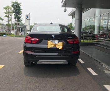 BMW X4 xDriver20i  2017 - Cần bán BMW X4 2.0 năm sản xuất 2017, màu đen, xe nhập 