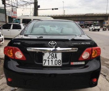 Toyota Corolla altis AT 2010 - Cần bán lại xe Toyota Corolla Altis AT sản xuất 2010, màu đen