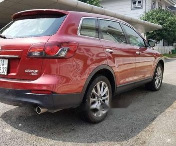 Mazda CX 9 2014 - Cần bán gấp Mazda CX 9 sản xuất 2014, màu đỏ xe gia đình