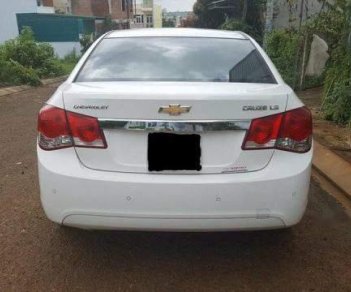 Chevrolet Cruze  LS 2014 - Bán nhanh xe Chevrolet Cruze đời 2014 số sàn, bản LS màu trắng zin không 1 trầy xước