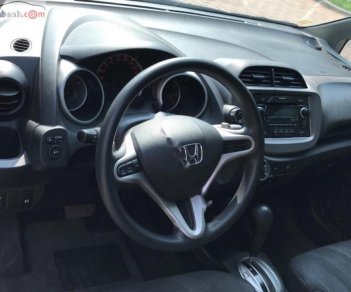 Honda FIT 1.5 AT 2009 - Cần bán lại xe Honda FIT 1.5 AT sản xuất 2009, màu bạc chính chủ, giá tốt