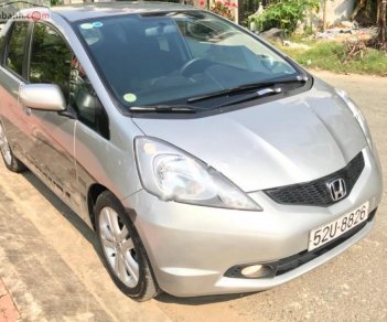 Honda FIT 1.5 AT 2009 - Cần bán lại xe Honda FIT 1.5 AT sản xuất 2009, màu bạc chính chủ, giá tốt