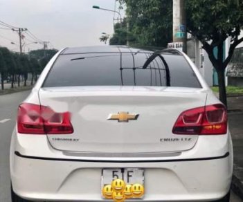 Chevrolet Cruze   1.8LTZ  2015 - Bán Chevrolet Cruze 1.8LTZ năm sản xuất 2015, màu trắng xe gia đình giá cạnh tranh