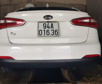 Kia K3   2015 - Cần bán lại xe Kia K3 sản xuất 2015, màu trắng số sàn