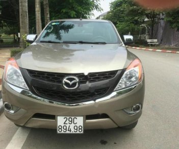 Mazda BT 50 2.2L 4x4 MT 2014 - Bán xe Mazda BT 50 2.2L 4x4 MT đời 2014, màu vàng, nhập khẩu