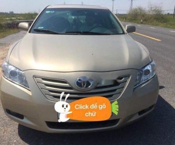 Toyota Camry  LE 2007 - Bán Toyota Camry LE năm sản xuất 2007, màu vàng, xe nhập Mỹ, giá 585tr