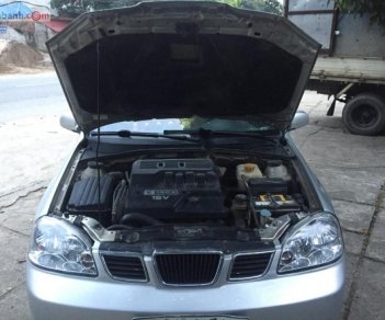 Daewoo Lacetti ex 2004 - Cần bán Daewoo Lacetti ex năm 2004, màu bạc 