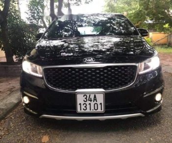 Kia Sedona GATH 3.3AT 2015 - Cần bán lại xe Kia Sedona GATH 3.3AT năm 2015, màu đen như mới