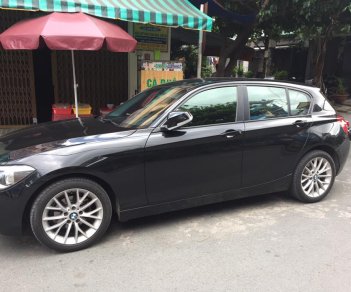 BMW 1 Series 116i 2013 - Bán em BMW 116i đời 2013 màu đen, số tự động, 8 cấp