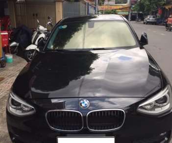 BMW 1 Series 116i 2013 - Bán em BMW 116i đời 2013 màu đen, số tự động, 8 cấp