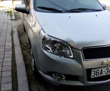 Chevrolet Aveo LT 1.5 MT 2015 - Cần bán gấp Chevrolet Aveo LT 1.5 MT năm 2015, màu bạc