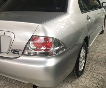 Mitsubishi Lancer 2004 - Cần bán gấp Mitsubishi Lancer sản xuất 2004, màu xám (ghi) còn mới, giá chỉ 213 triệu