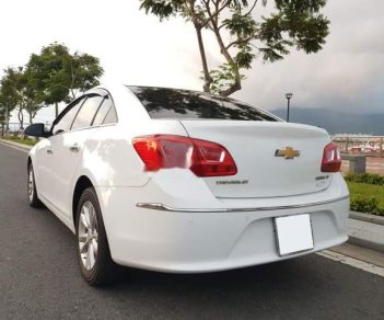 Chevrolet Cruze 1.6MT 2016 - Bán Chevrolet Cruze 1.6MT 2016, màu trắng xe gia đình