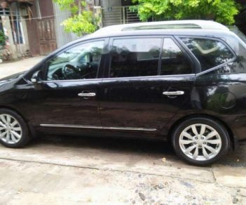 Kia Carens 2011 - Cần bán lại xe Kia Carens sản xuất 2011, màu đen số tự động