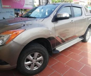 Mazda BT 50 2015 - Cần bán Mazda BT 50 sản xuất năm 2015, màu vàng, nhập khẩu, số sàn