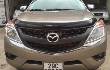 Mazda BT 50 2015 - Cần bán Mazda BT 50 sản xuất năm 2015, màu vàng, nhập khẩu, số sàn