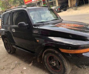 Ssangyong Korando  MT 2003 - Bán xe Ssangyong Korando MT đời 2003, màu đen, máy gầm ngon