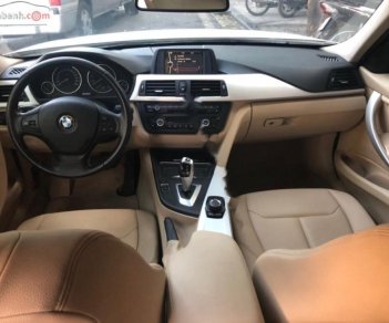 BMW 3 Series 320i 2014 - Bán xe BMW 3 Series 320i đời 2014, màu trắng, xe nhập xe gia đình 