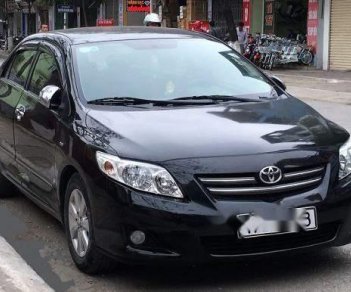 Toyota Corolla altis MT 2009 - Cần bán gấp Toyota Corolla altis MT sản xuất năm 2009, màu đen giá cạnh tranh