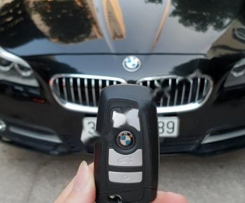 BMW 5 Series 520i 2015 - Chính chủ bán xe BMW 5 Series 520i đời 2015, màu đen, xe nhập