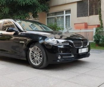 BMW 5 Series 520i 2015 - Chính chủ bán xe BMW 5 Series 520i đời 2015, màu đen, xe nhập