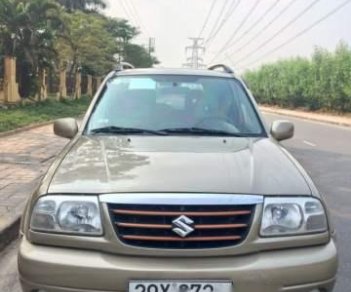 Suzuki Grand vitara  AT 2003 - Cần bán lại xe Suzuki Grand vitara AT năm 2003, màu vàng số tự động