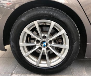 BMW 3 Series 320i 2012 - Cần bán lại xe BMW 3 Series 320i sản xuất năm 2012, màu nâu, xe nhập, 785tr