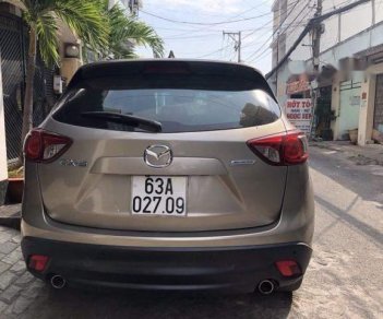 Mazda CX 5 2.0 2014 - Cần bán xe Mazda CX 5 2.0 đời 2014, màu nâu ít sử dụng