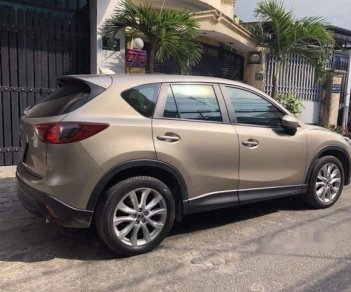 Mazda CX 5 2.0 2014 - Cần bán xe Mazda CX 5 2.0 đời 2014, màu nâu ít sử dụng