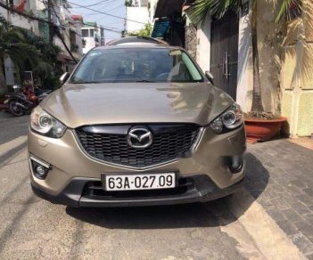 Mazda CX 5 2.0 2014 - Cần bán xe Mazda CX 5 2.0 đời 2014, màu nâu ít sử dụng