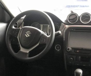 Suzuki Vitara 1.6AT 2015 - Cần bán Suzuki Vitara 1.6AT sản xuất 2015, màu đen, nhập khẩu xe gia đình
