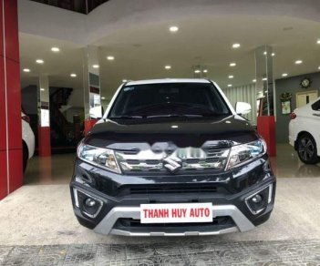 Suzuki Vitara 1.6AT 2015 - Cần bán Suzuki Vitara 1.6AT sản xuất 2015, màu đen, nhập khẩu xe gia đình