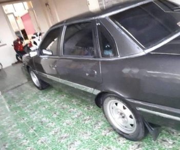 Ford Tempo 1994 - Chính chủ bán xe Ford Tempo 1994, màu xám, xe nhập, giá chỉ 65 triệu